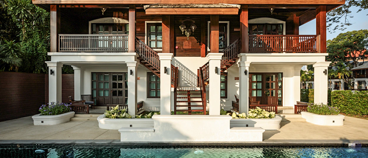 Stunning historical Thai resort villa with traditional architecture and a pool in Chiang Mai.