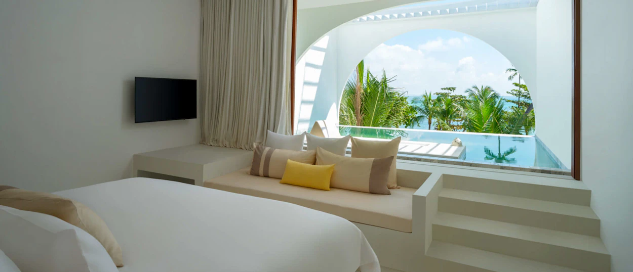Luxurious bedroom with a private pool and ocean view at a resort in Koh Samui, Thailand.